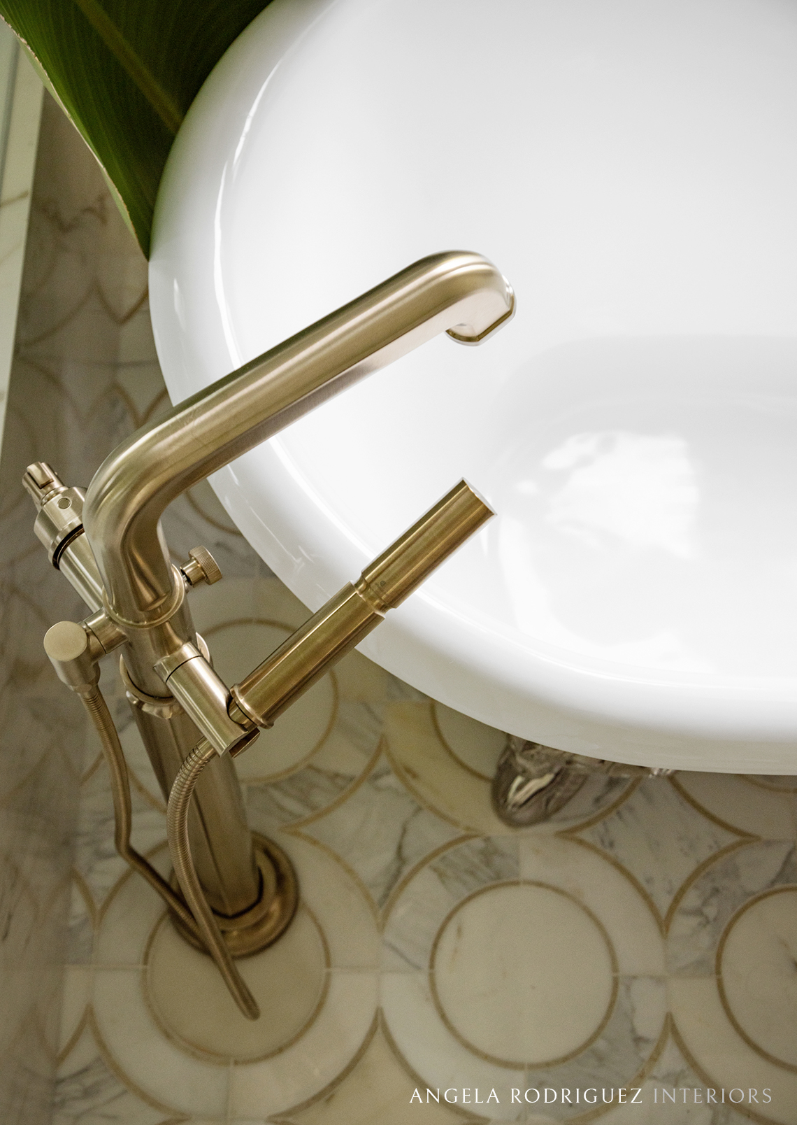 Close up of bath tub and marble flooring pattern