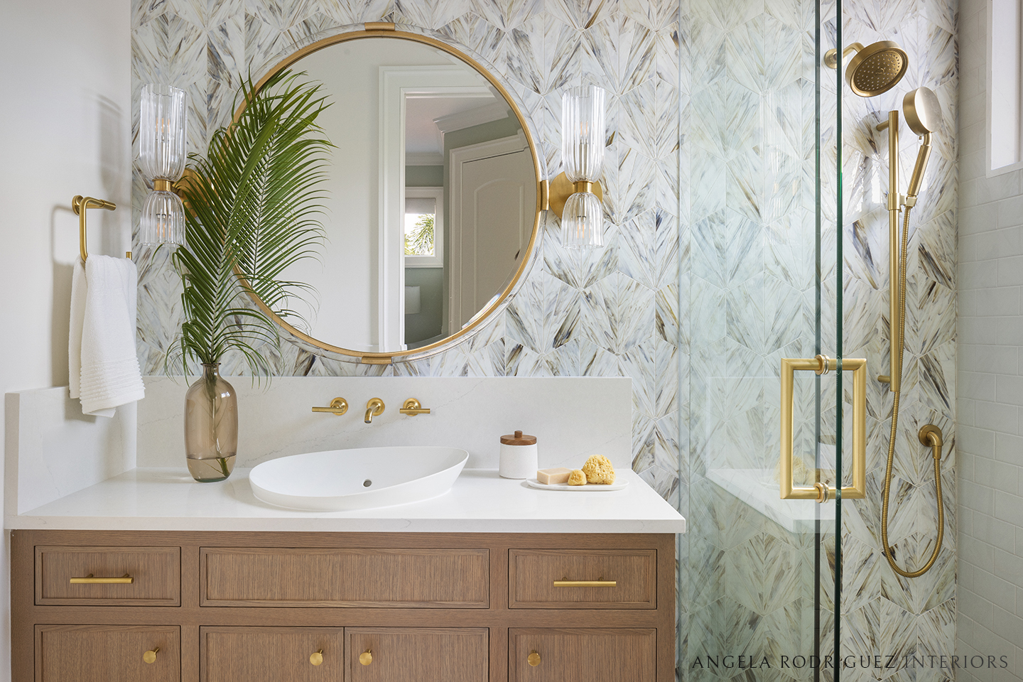 Bathroom with custom cabinetry and mosaic tile