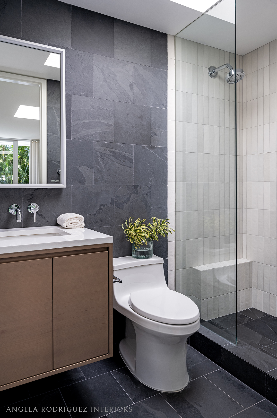 Bathroom with black and white tile