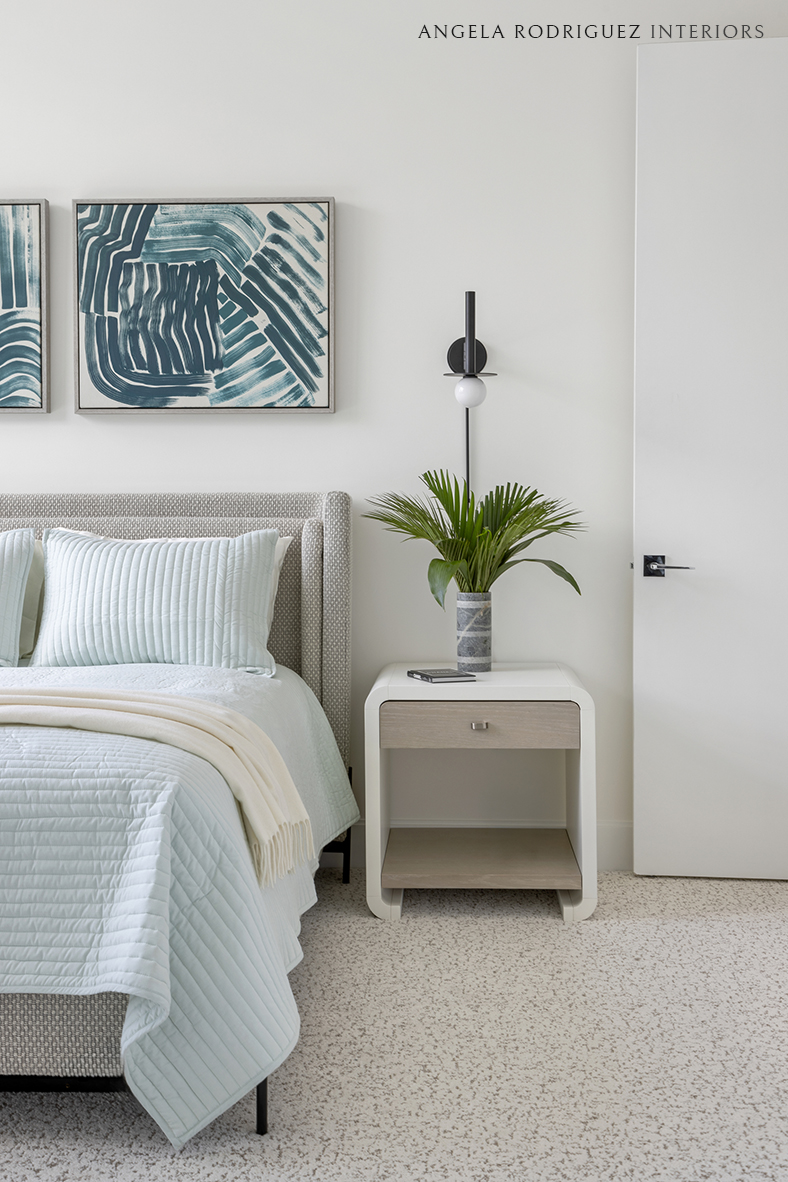 Guest bedroom with upholstered bed