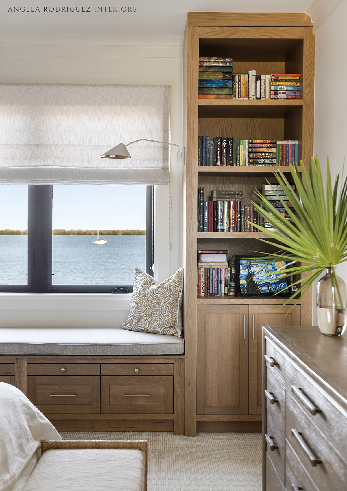 Built in bookcase next to window seat