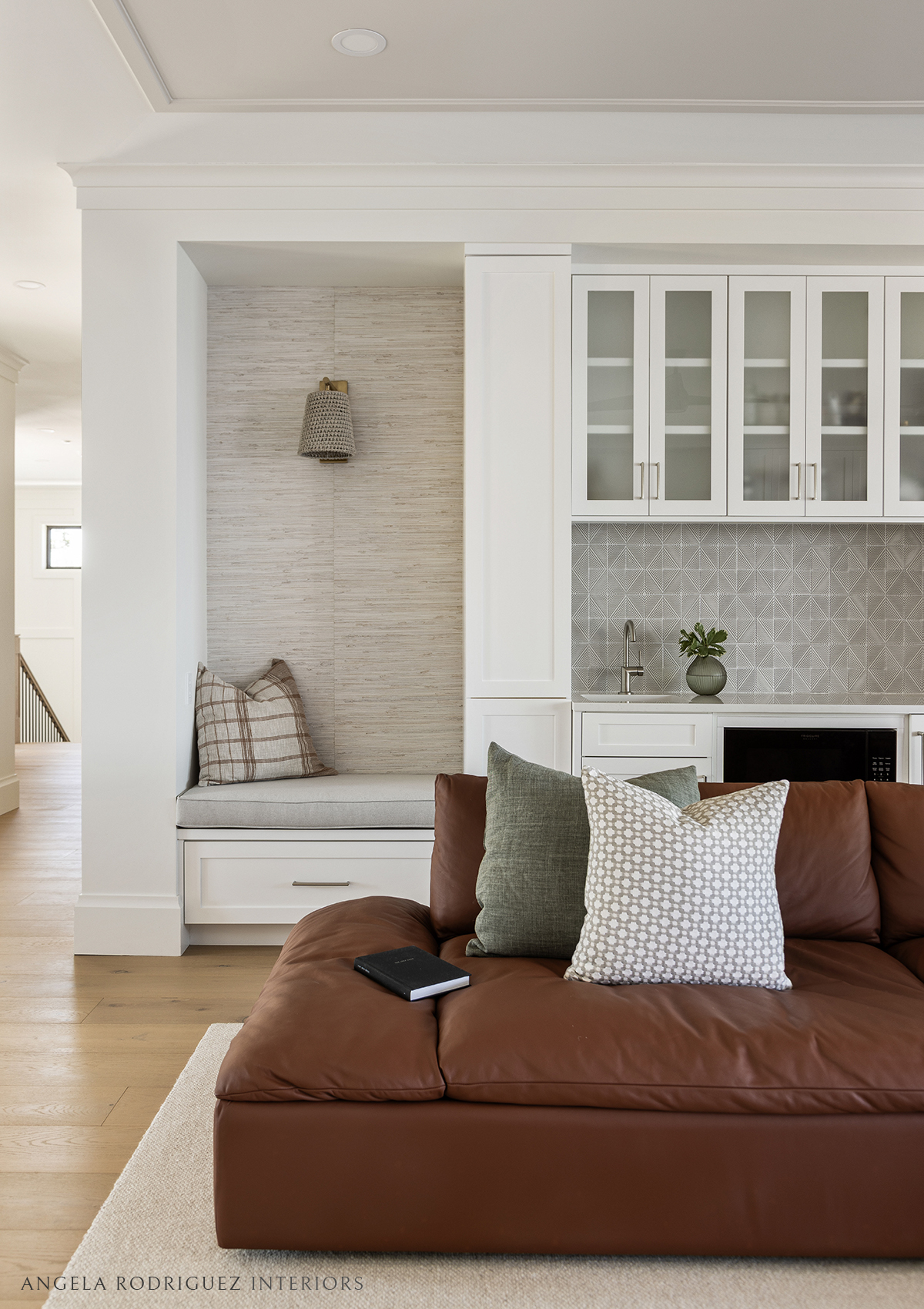 Lounge design with dark leather sofa