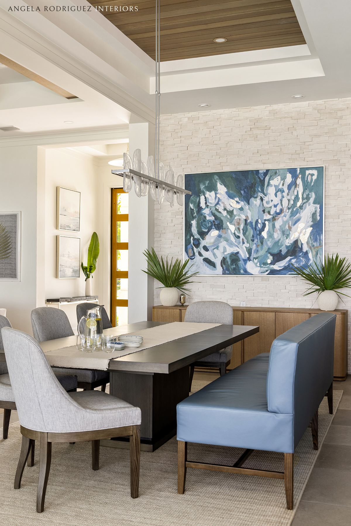 Dining room with stone wall