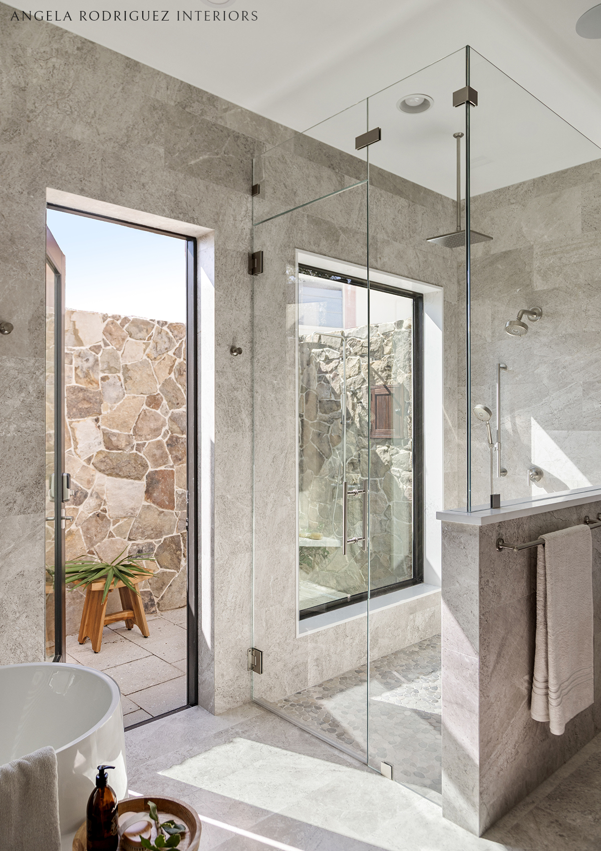 Bathroom with indoor and outdoor showers