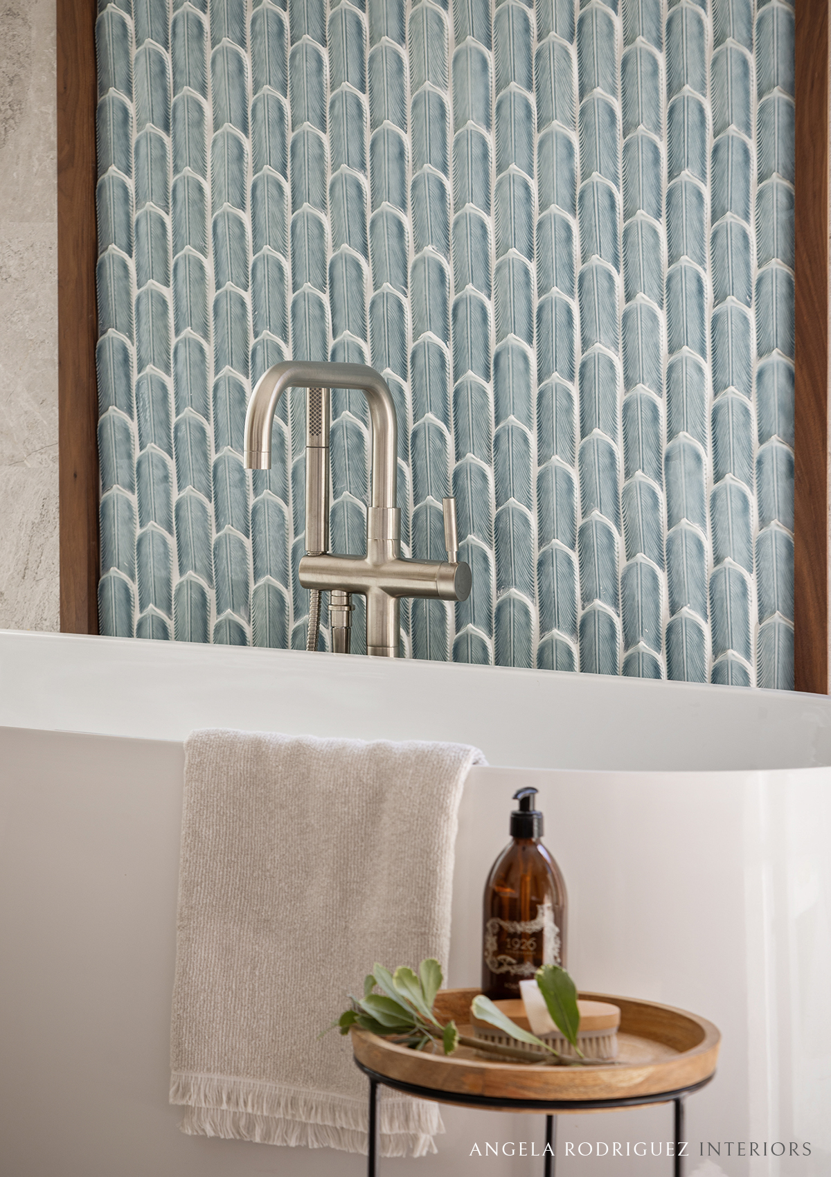 Blue tile and white bathtub